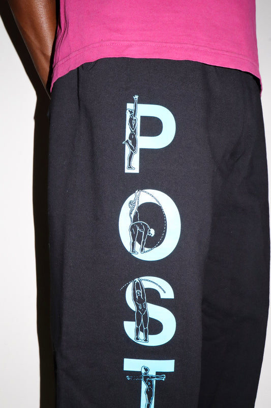 Black pants with white graphic design on a plain background