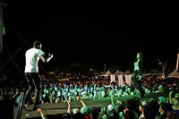people on stage within a crowd
