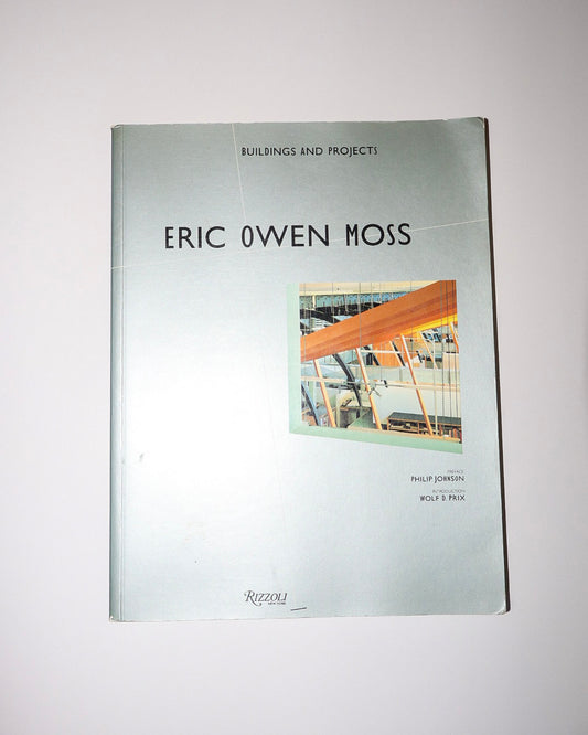 Book titled 'Eric Owen Moss: Buildings and Projects' on a white background