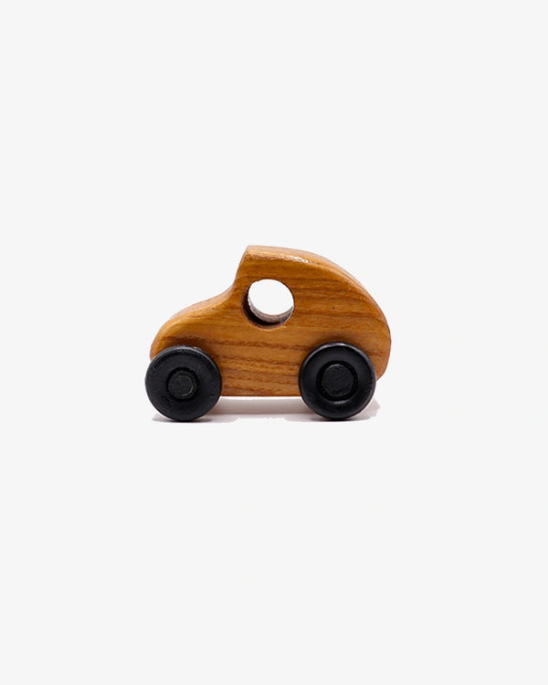 Wooden toy car with black wheels on a white background